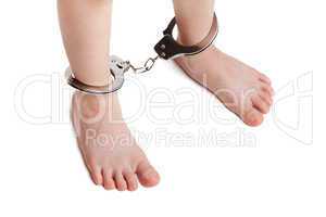 Handcuffs or legcuffs on legs