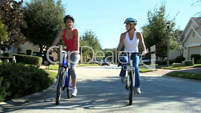 Female Friends Cycling Fun Together