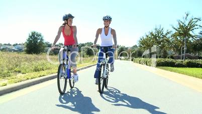 Female Friends Cycling Fitness