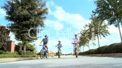Healthy Caucasian Family Cycling Together