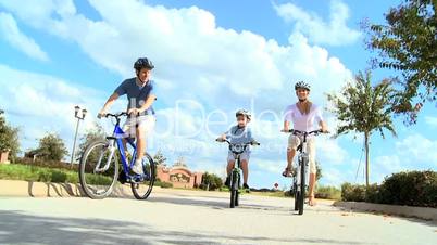 Healthy Caucasian Family Cycling Together