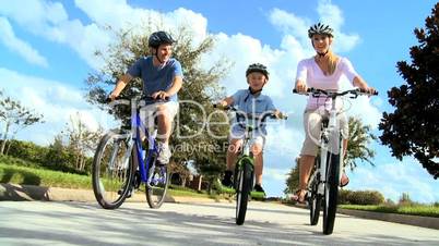 Healthy Caucasian Family Cycling Together