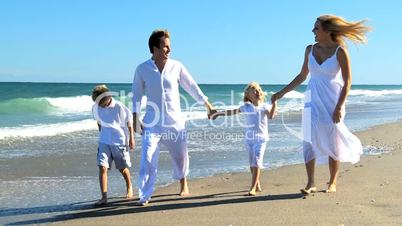 Happy Family Group Enjoying Beach Lifestyle
