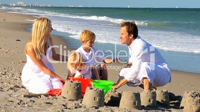 Young Caucasian Family Beach Fun