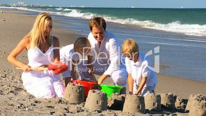 Children and Parents Playing in the Sand