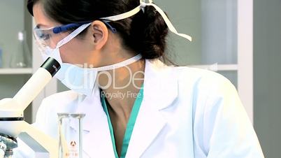 Female Student Doing Experimental Medical Research