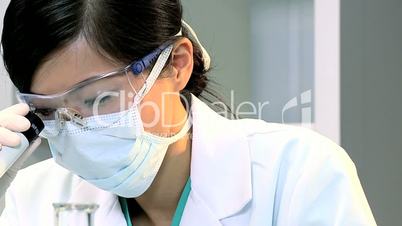 Female Medical Student in Hospital Laboratory