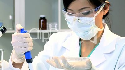 Medical Student Using Laboratory Equipment