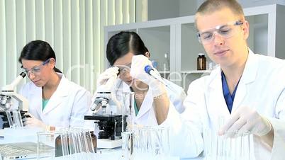 Three Student Doctors Studying in Hospital Laboratory