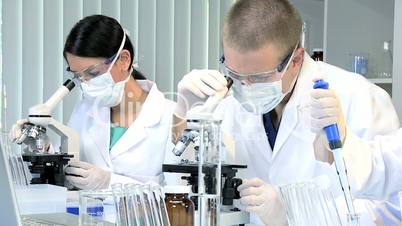 Three Student Doctors Working in Hospital Laboratory