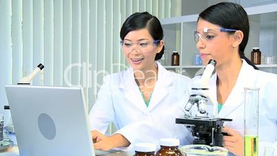 Research Students Working in Medical Laboratory