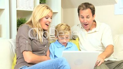 Family Using Online Web Chat Talking to Friends
