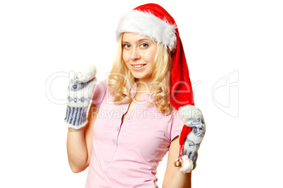 Woman in warm mittens and a red Santa Claus hat