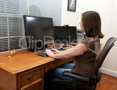 Woman at computer desk