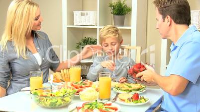 Caucasian Family Eating Healthy Lunch Together