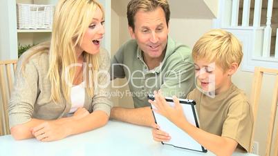 Caucasian Family Using Wireless Tablet