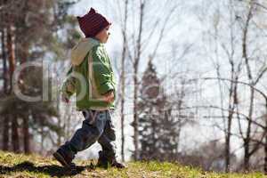 Child walking forest