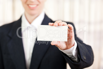 Blank card in women hand