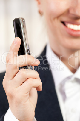 Mobile phone in women hand