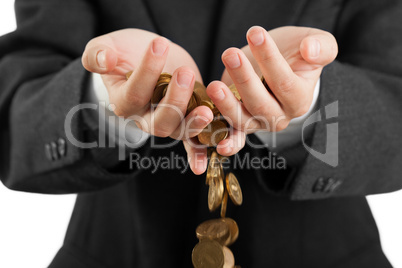 Spilling coins in hands