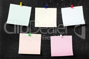 Pinned post-it paper note