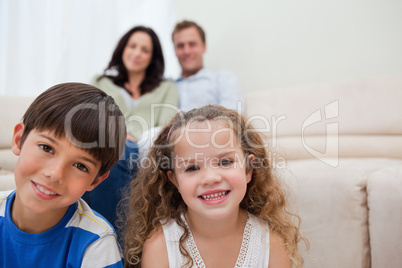 Family sitting in the living room