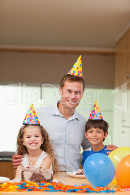 Father celebrating with his kids