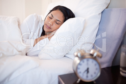 Side view of woman sleeping