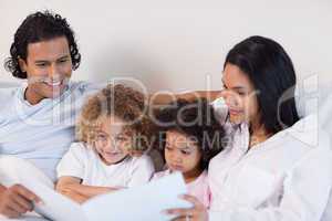 Happy family enjoys reading a story together