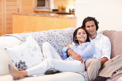 Happy couple on the couch together