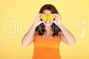 Woman Having Fun With Oranges