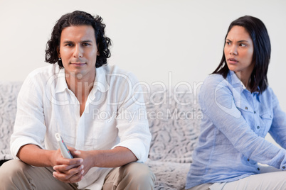 Couple having a dispute in the living room