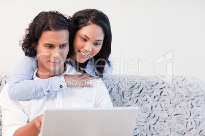 Couple on the laptop together