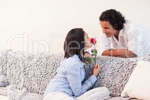 Couple celebrating valentines day in the living room