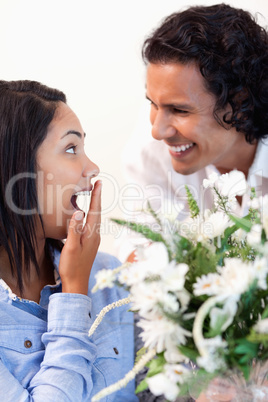 Woman is surprised by the bouquet she got from her boyfriend