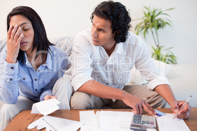 Couple checking their bills