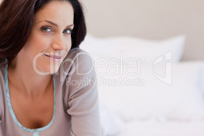 Woman lying on the bed