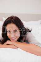 Smiling woman on the bed