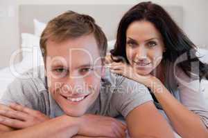 Young couple on the bed together