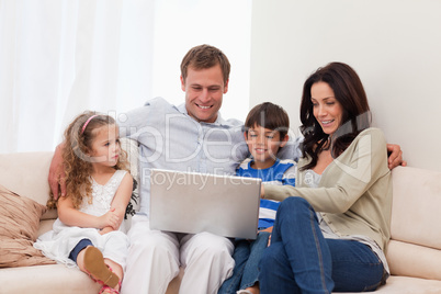 Family surfing the internet together