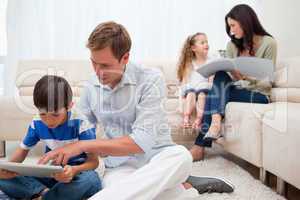 Family spending spare time in the living room