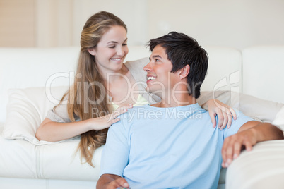 Lovely couple watching television