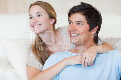 Close up of a smiling couple posing