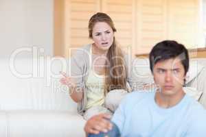Upset young couple arguing