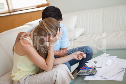 Sad couple in financial trouble