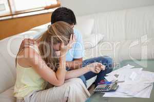 Sad couple in financial trouble