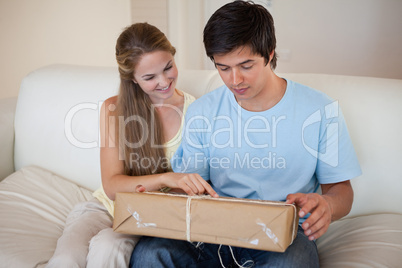 Couple looking at a package