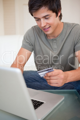 Portrait of a man shopping online