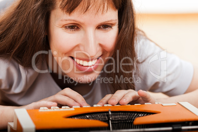 Woman typing typewriter