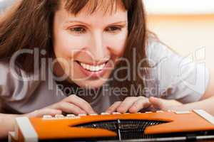 Woman typing typewriter